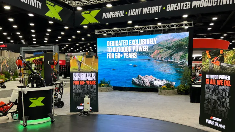 ECHO Incorporated trade show booth with an LED wall displaying outdoor power equipment branding